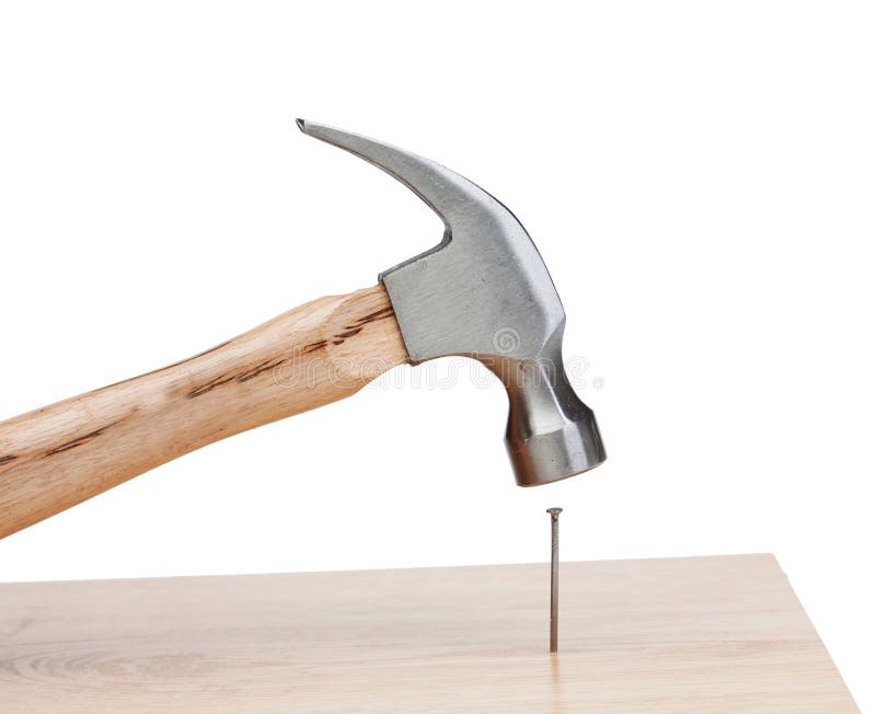 Hammer Hitting a Nail into a Wood Stock Image - Image of construction