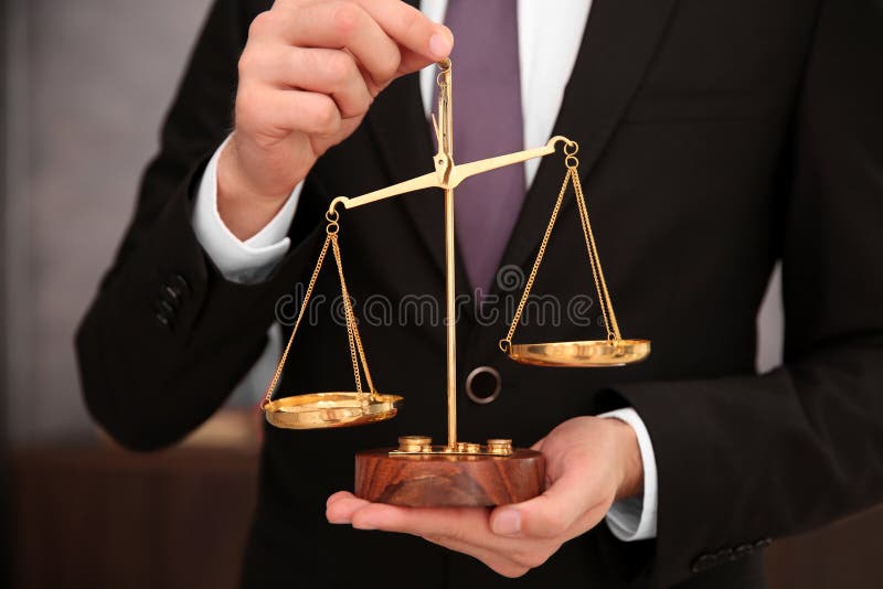 Lawyer Holding Court Scales Stock Image - Image of brown, justice