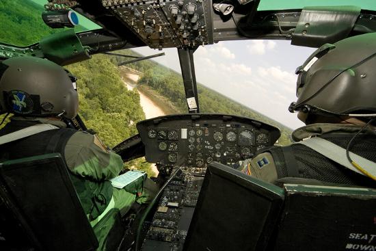 'Two Instructor Pilots Practice Low Flying Operations in a Uh-1H Huey